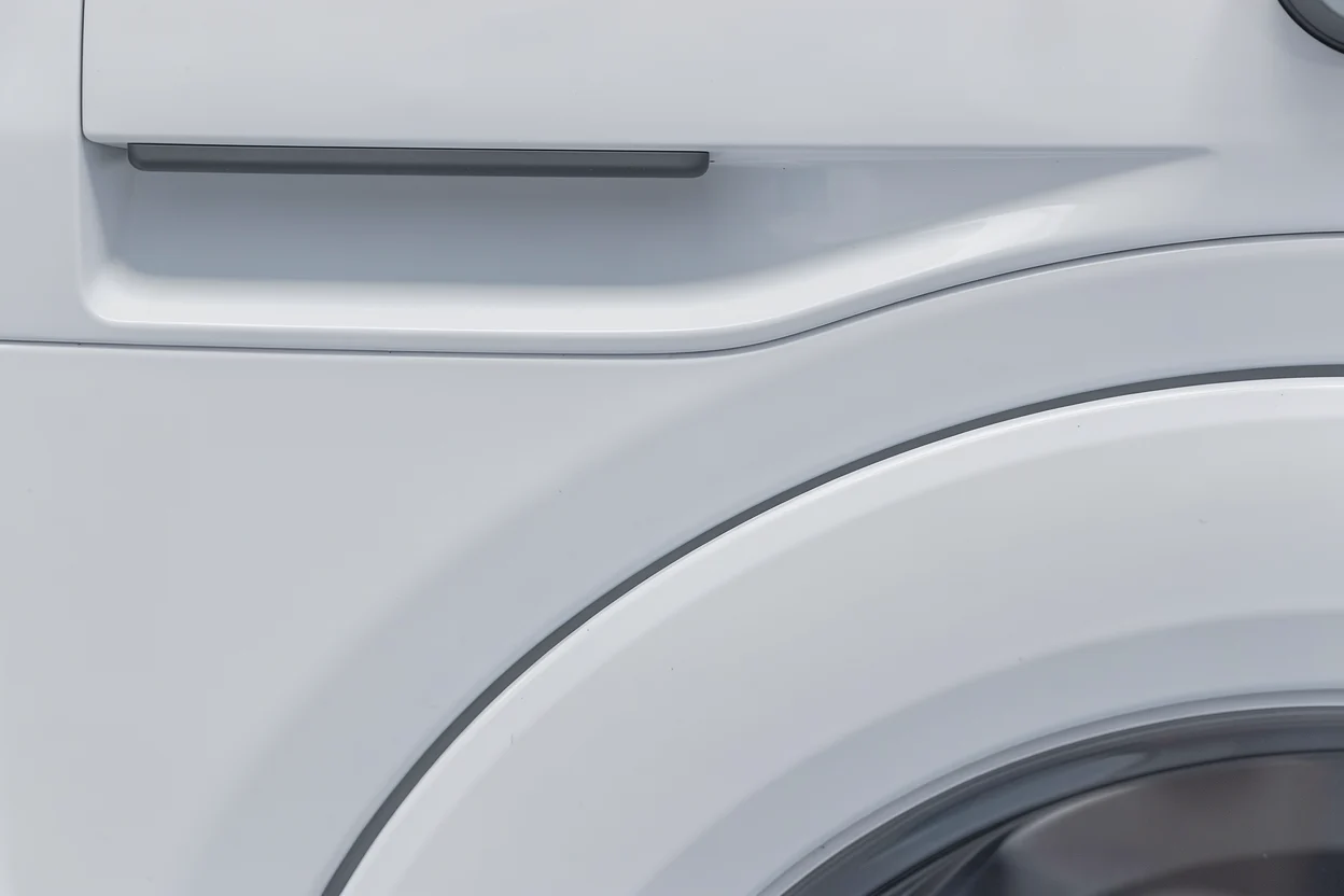 Ladegreep en witte draaiknop van de AEG LF62CW84